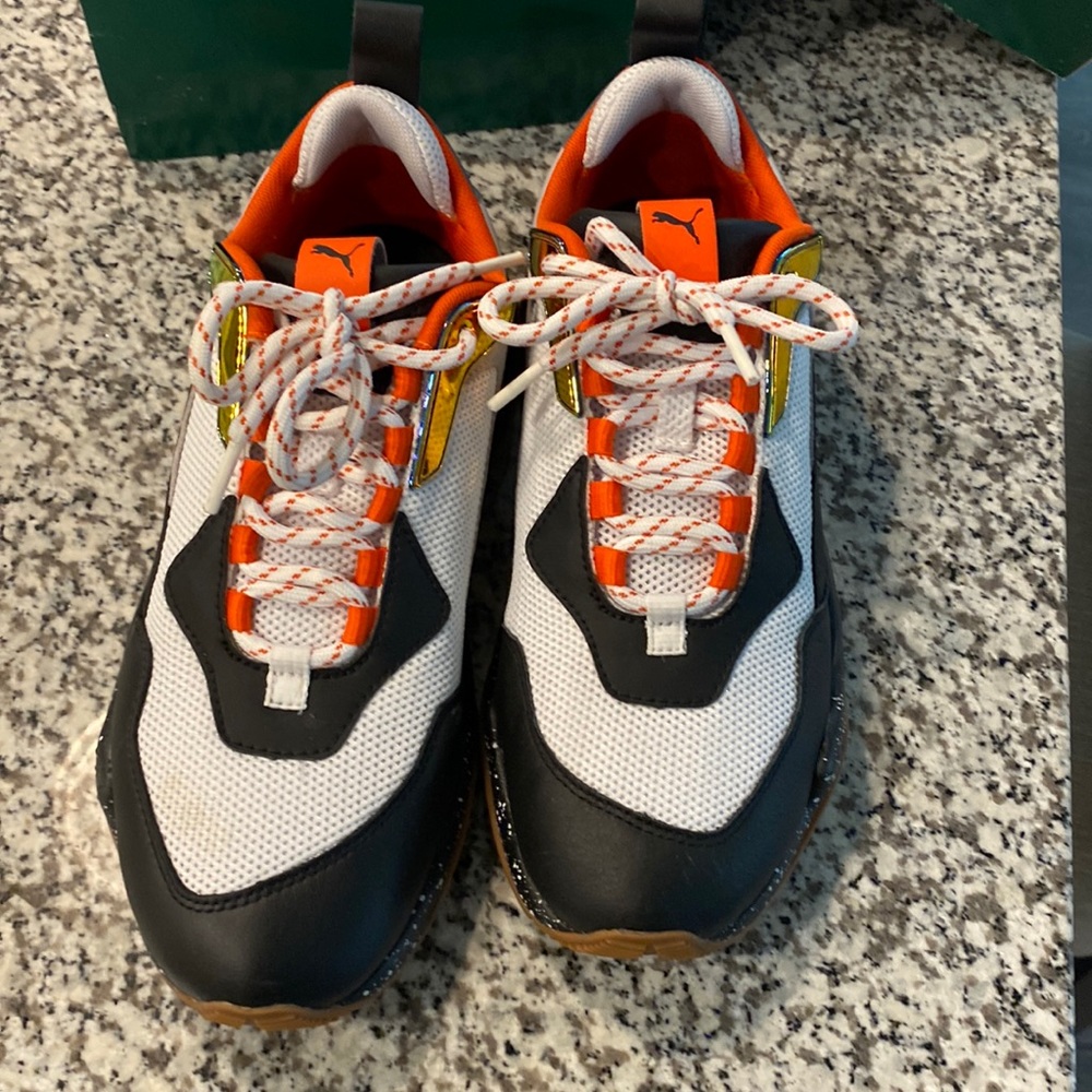 Size 8 puma sneaker black and white color
